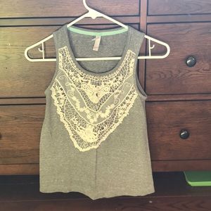 grey tank top with lace on the chest